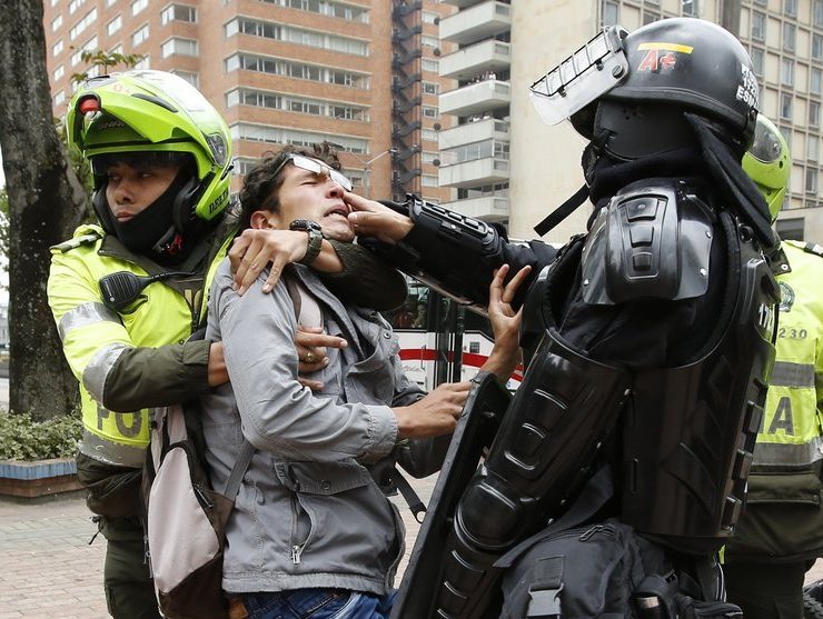 Police in Colombia break up legalization rally after protestors light up